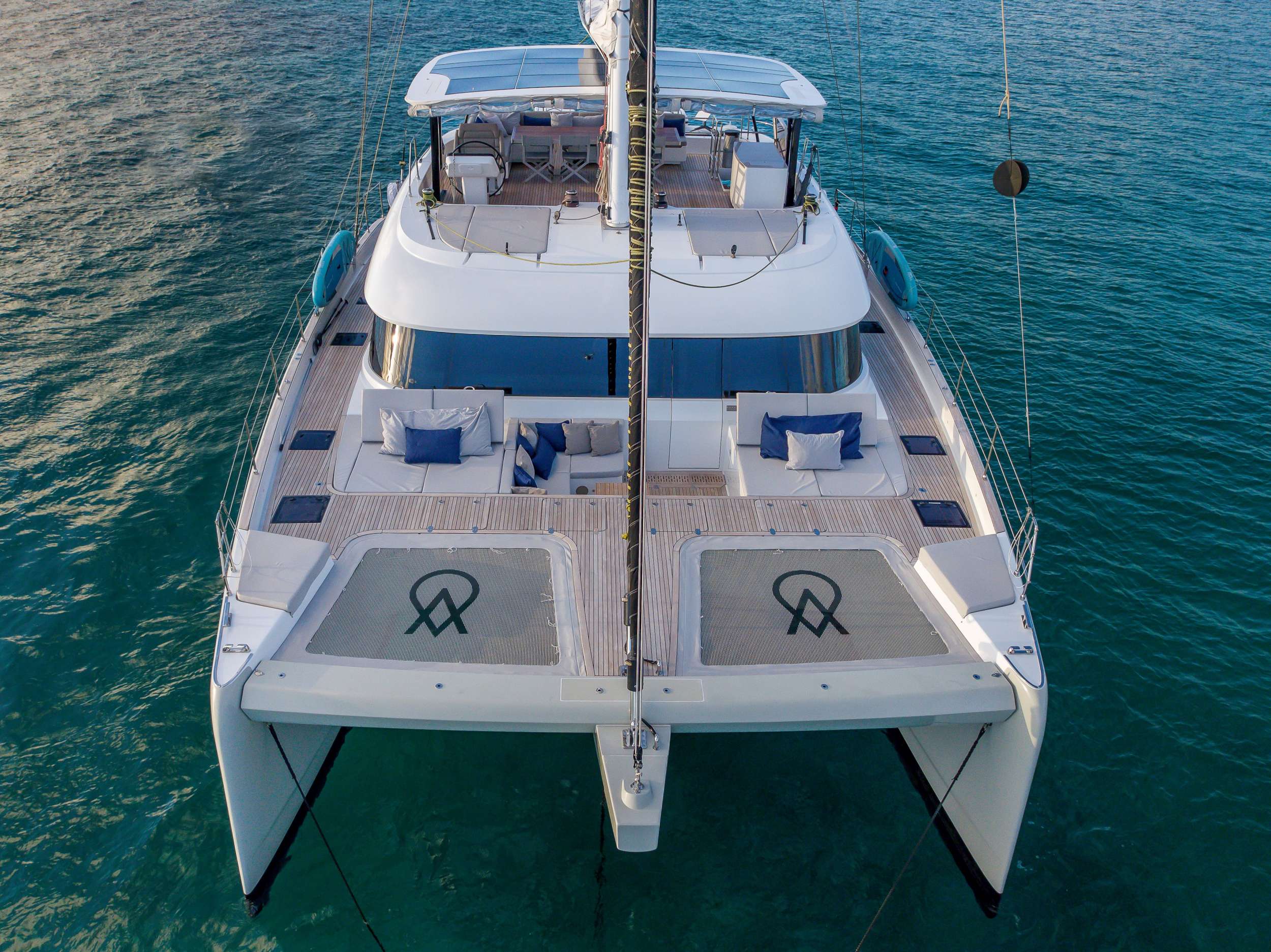 Aerial bow view of the foredeck and trampolines