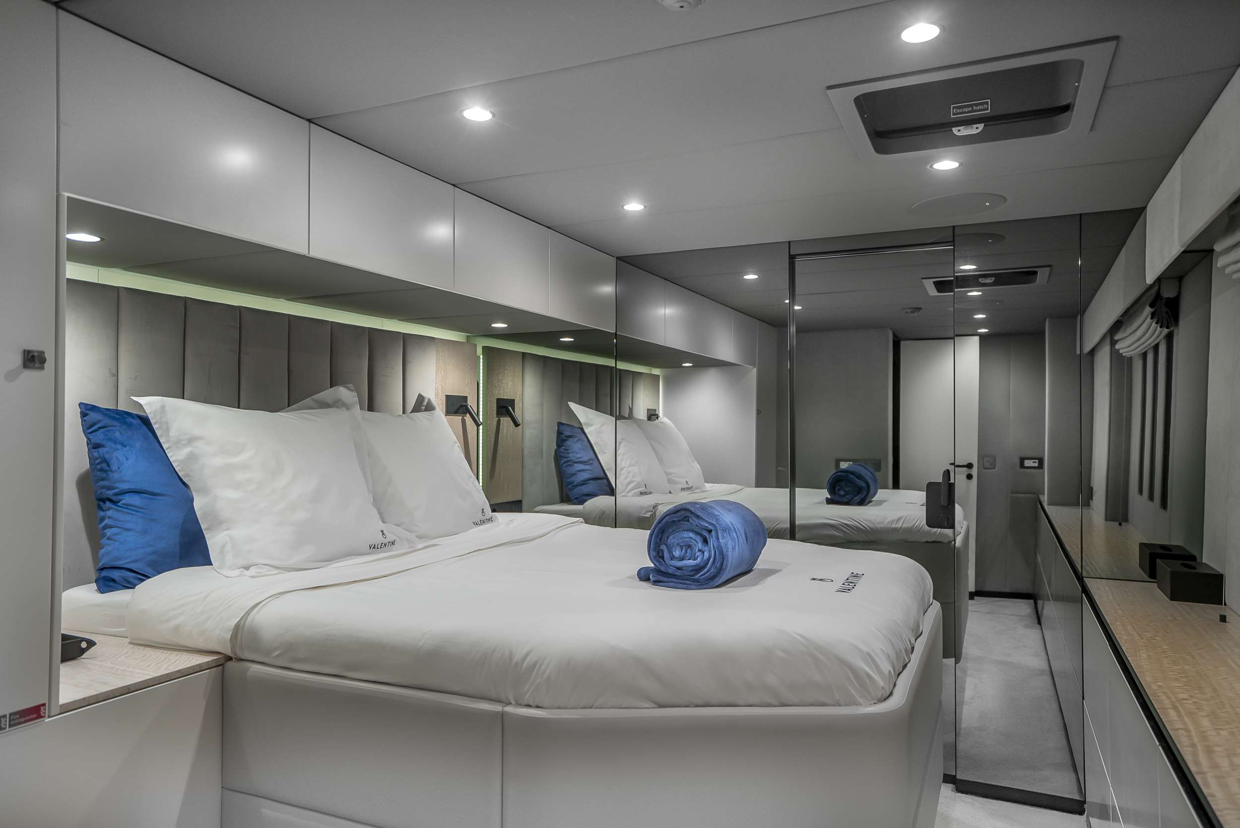 Guest stateroom with mirrored joinery